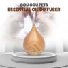 Wooden essential oil diffuser, Gou Gou Pets brand with cat in background.