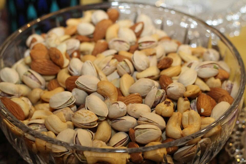 white yellow and brown peanut on clear glass basin